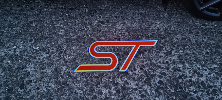 “ST” Emblem Replacement Puddle Unit - MK4 / MK4.5 Focus ST (Multiple Colours)