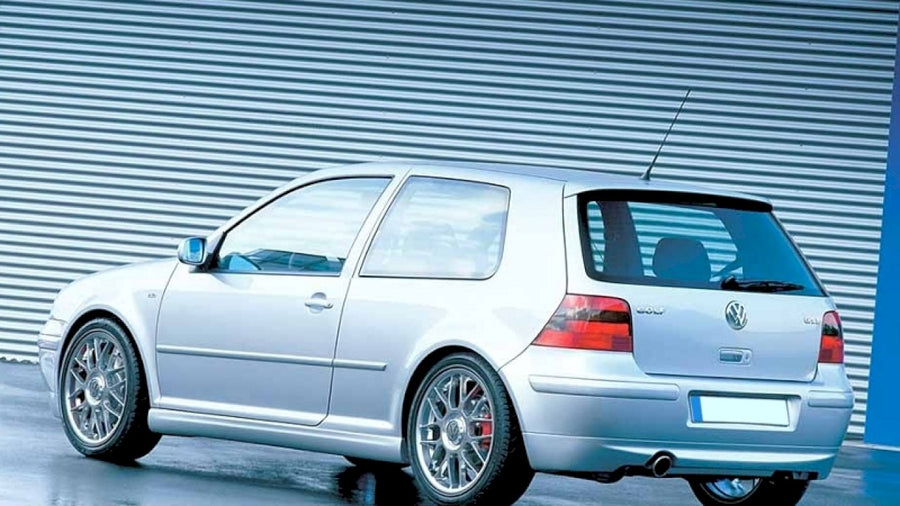Maxton Design - REAR BUMPER EXTENSION VW GOLF 4 25'TH ANNIVERSARY LOOK (WITH EXHAUST HOLE)